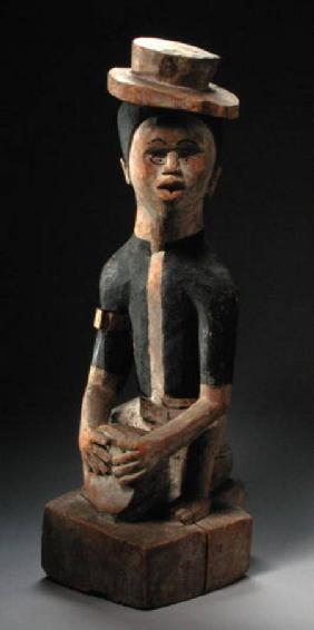 Kongo Figure of Woman on a Drum, Congo