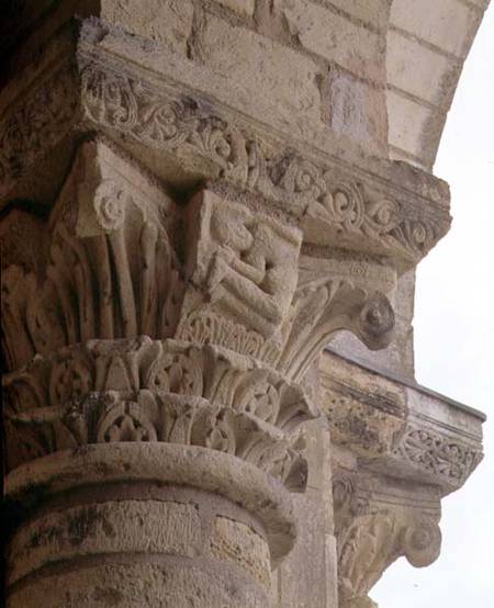 Column capital with stylised foliage designs around the figure of an acrobatfrom the porch exterior de Anonymous