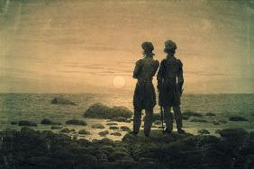 Dos hombres en el mar al amanecer