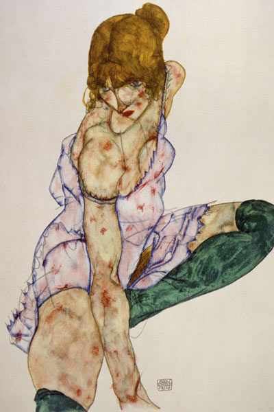 Chica rubia con medias verdes de Egon Schiele