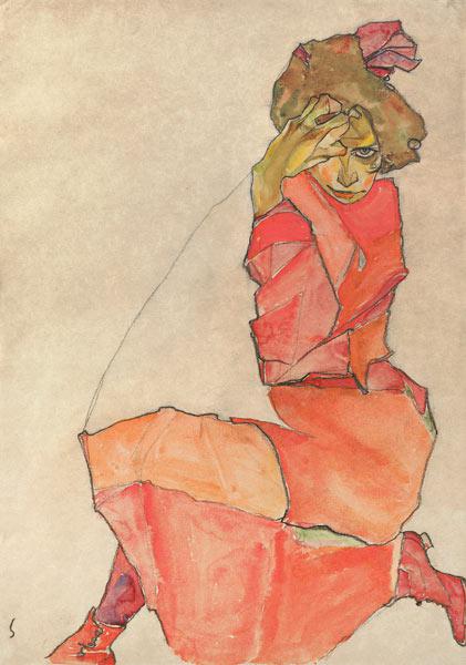 Mujer arrodillada con vestido rojo-naranja