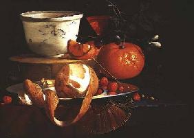 Still life of an orange, a lemon and strawberry on a pewter plate, a wan-li bowl behind