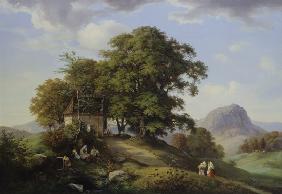 Mountainous landscape with cluster of trees and ch