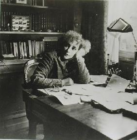 Portrait of Sidonie Gabrielle Colette (1873-1954), in her study (b/w photo)