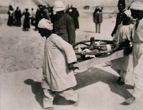 One of the chariot wheels being removed from the Tomb of Tutankhamun, Valley of the Kings, 1922 (gel