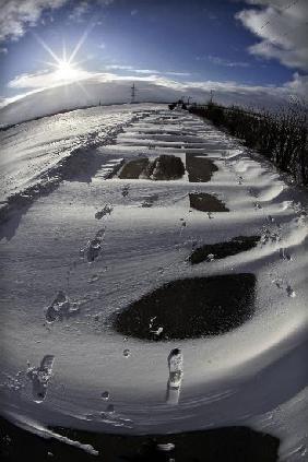 Schneewehen auf Straße