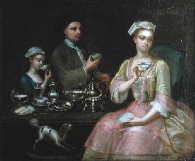 A Family of Three at Tea