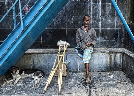 The man and the dog. (Kolkata, India)