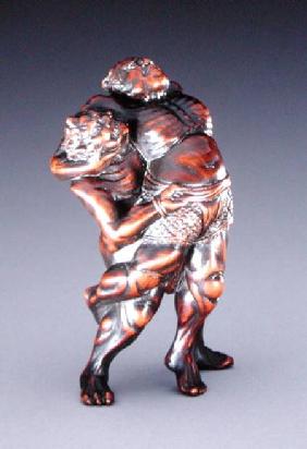 Netsuke depicting a deity wrestling a demon