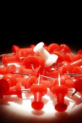 Red push pins, close-up