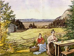 Look over a hill landscape with two women at a tab