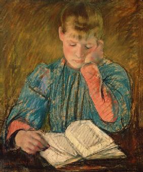 una joven leyendo
