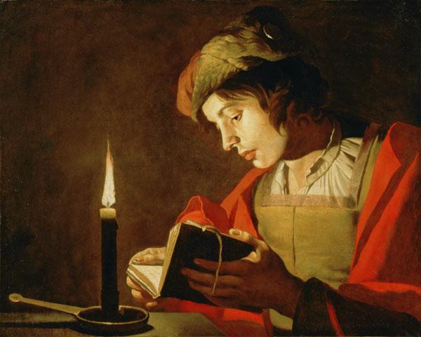 Young Man Reading by Candle Light