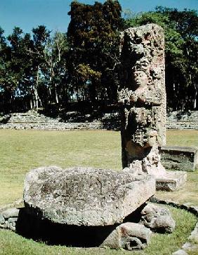 Stele C depicting Eighteen Rabbit and a statue of a two-headed turtle in front