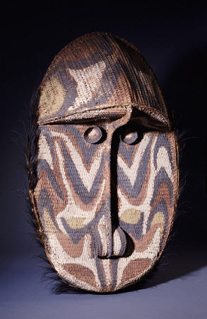 A Large Iatmul Woven Rattan Gable Mask, Of Oval Form With Projecting Forehead de 