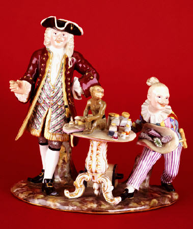 A Meissen Porcelain Group Of The Quack Doctor And Harlequin After An Original Model By J de 