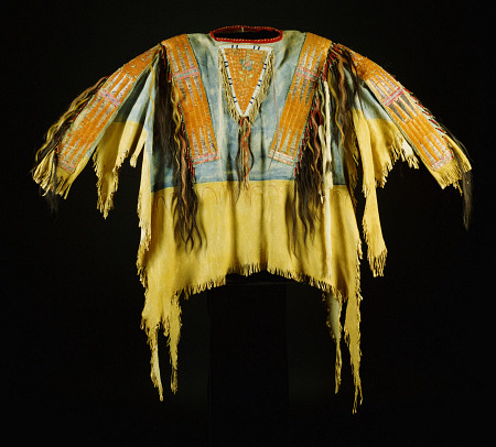 A Southern Cheyenne Quilled And Fringed Hide Warrior''s Shirt de 