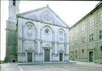 Facade of the Cathedral designed by Bernardo Rossellino (1409-64), the pediment bearing the papal ar