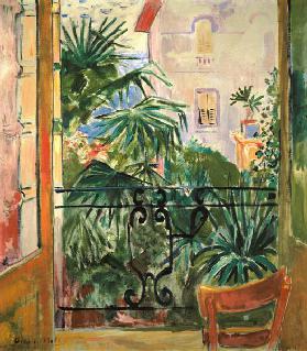 View from the balcony of palms and a house Abbazia 1920