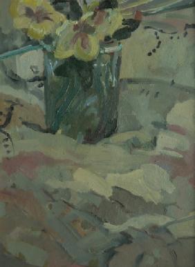 Yellow flowers in green pot