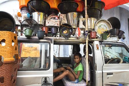 Boy with lottery van