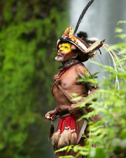 Huli Wigman by the Waterfall